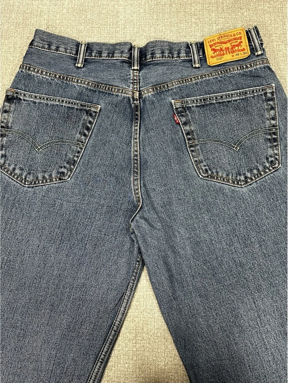 Levi’s 550 Relaxed Fit Jeans Men’s 35x32 Blue Denim Distressed Hole Vintage
